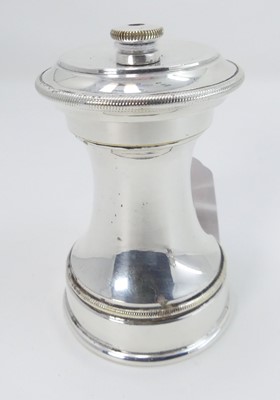 Lot 434 - A continental white metal pepper mill, h.9cm