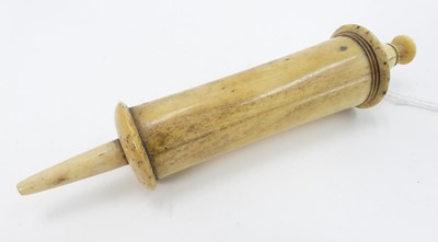 Lot 438 - A 19th century turned bone medical syringe,...