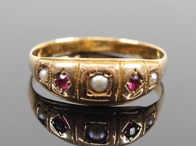 Lot 325 - A vintage 18ct gold ruby and seed pearl set...