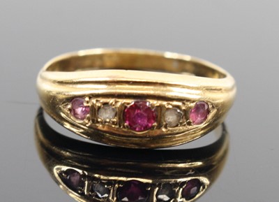 Lot 326 - A vintage yellow metal ruby and rose cut...