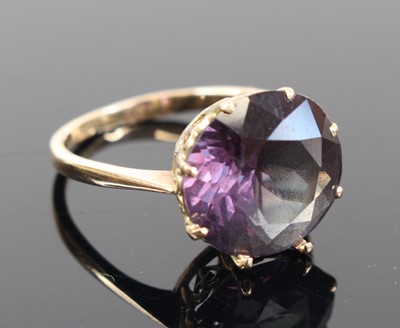 Lot 329 - A 9ct gold amethyst solitaire ring, the...