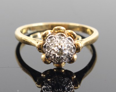 Lot 333 - An 18ct gold diamond point set flower head...