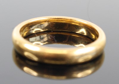 Lot 334 - A 22ct gold wedding band, sponsor L.W., size N,...