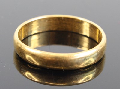 Lot 340 - A 22ct gold court shaped wedding band, size P, 4g