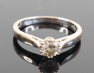 Lot 342 - An 18ct white gold diamond solitaire ring, the...