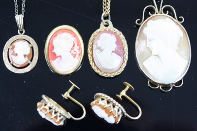 Lot 345 - A pair of 9ct gold carved shell cameo set ear...