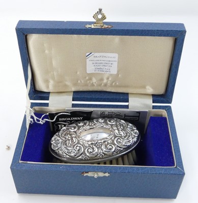 Lot 461 - A modern silver backed hand brush in the...