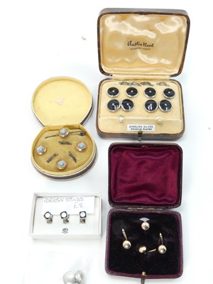 Lot 463 - A set of eight sterling silver and rhodium...