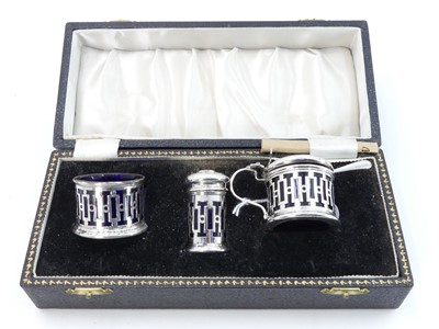 Lot 466 - A modern silver three piece cruet set to...