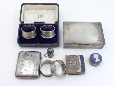 Lot 474 - A George V silver pocket cigarette case,...