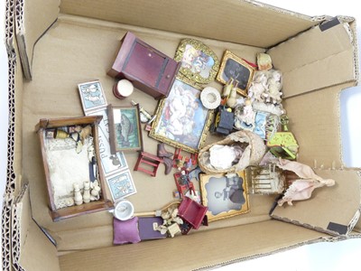 Lot 509 - A box of assorted dolls house furnishings and...