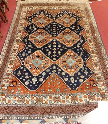 Lot 1159 - A Turkish woollen blue & rust ground Heriz rug,...