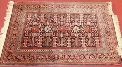 Lot 1164 - A Persian woollen red ground Mahal rug, with...