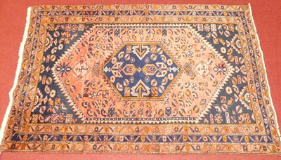 Lot 1165 - A Persian woollen and red ground Zanjan rug,...