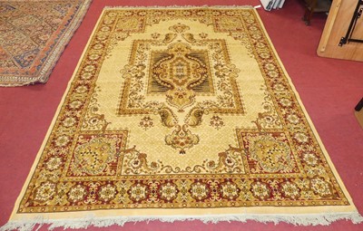 Lot 1169 - Two similar rust ground Persian style rugs,...