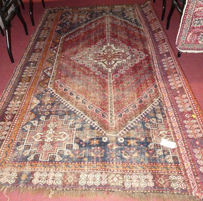 Lot 1178 - A Turkish woollen red & blue ground Kazak rug...