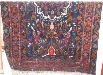 Lot 1181 - A Persian deep blue ground woollen Senneh rug,...