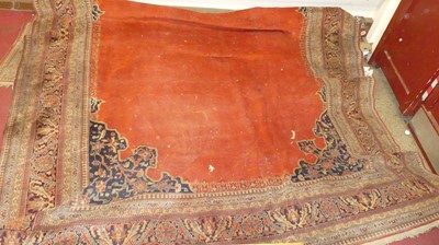 Lot 1184 - A large Persian woollen red ground Shiraz rug