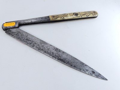 Lot 555 - An Italian knife, having a 22cm folding steel...