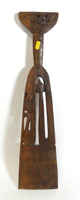 Lot 569 - An early 20th century Oceanic carved wooden...