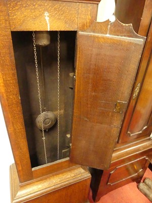 Lot 1195 - A circa 1800 provincial oak longcase clock,...