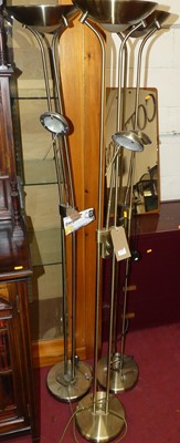 Lot 1199 - A set of three contemporary brushed metal...