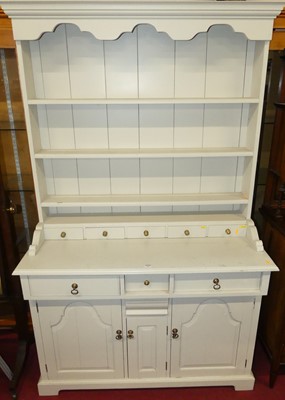 Lot 1201 - A hardwood and later painted kitchen dresser,...