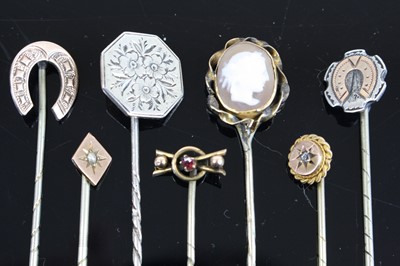 Lot 375 - Seven various cased Victorian stick pins, to...