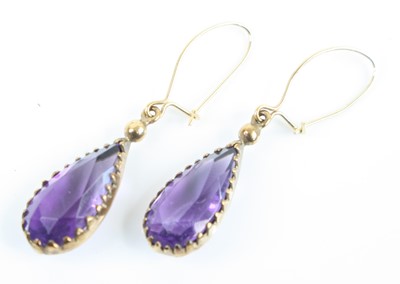 Lot 380 - A pair of yellow metal and pear-cut amethyst...