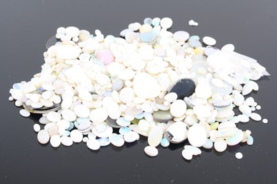 Lot 386 - A bag of assorted loose opal cabochons,...