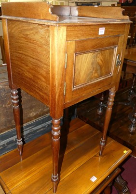 Lot 1258 - A Regency mahogany single door pot cupboard on...