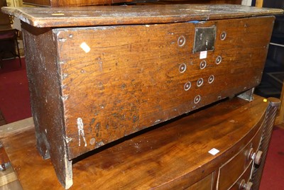 Lot 1264 - A circa 1700 provincial elm 6-plank hinge top...