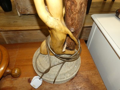 Lot 1354 - A fashioned stained root wood floor lamp