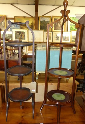 Lot 1275 - Two mahogany three-tier cake stands, one with...