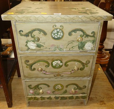 Lot 1360 - A small floral painted chest, having two lower...