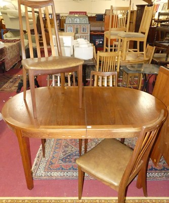 Lot 1301 - A 1970s teak D-end extending dining table,...