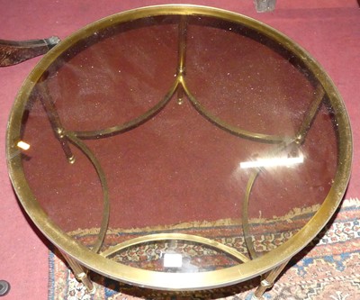 Lot 1305 - A 1980s gilt brass circular coffee table,...