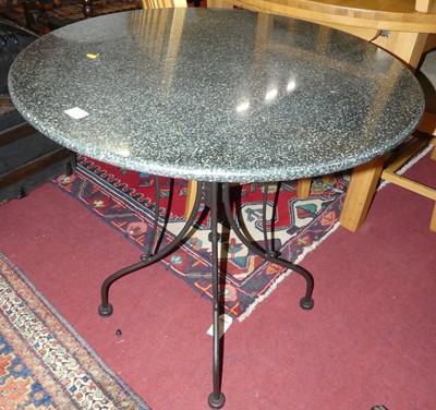 Lot 1308 - A contemporary polished granite-topped...