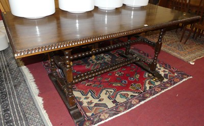 Lot 1310 - A Spanish walnut refectory table, having a...