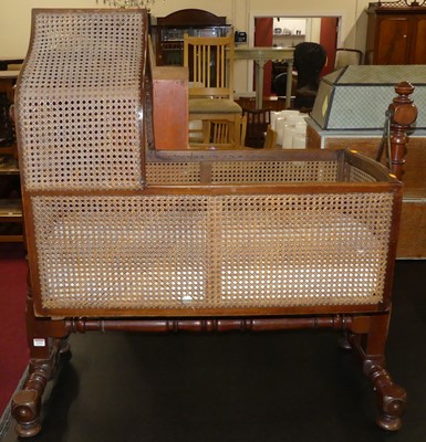 Lot 1315 - A Victorian mahogany and cane inset baby's...