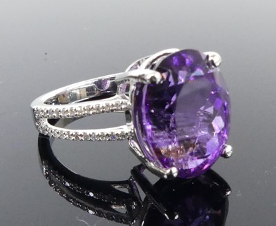 Lot 2512 - A white metal amethyst and diamond ring,...