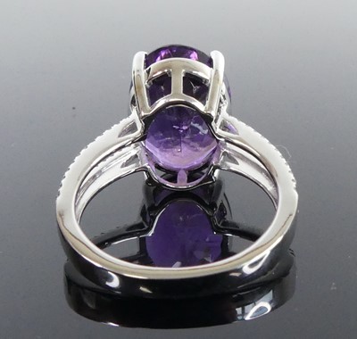 Lot 2512 - A white metal amethyst and diamond ring,...