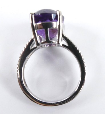 Lot 2512 - A white metal amethyst and diamond ring,...