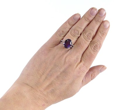 Lot 2512 - A white metal amethyst and diamond ring,...