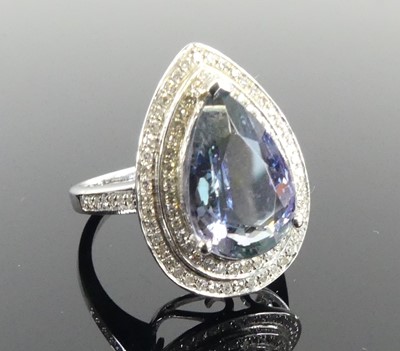 Lot 2513 - A white metal tanzanite and diamond pear...