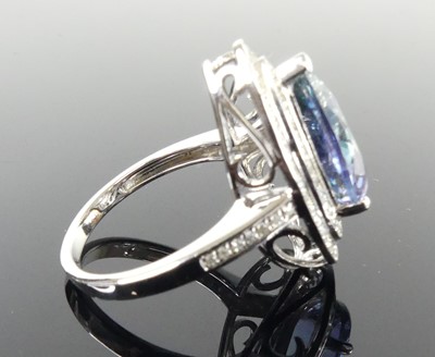 Lot 2513 - A white metal tanzanite and diamond pear...