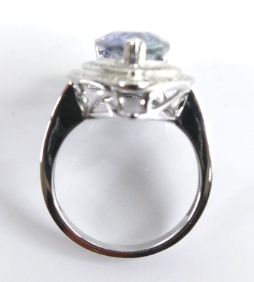 Lot 2513 - A white metal tanzanite and diamond pear...