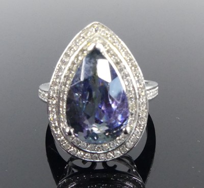 Lot 2513 - A white metal tanzanite and diamond pear...