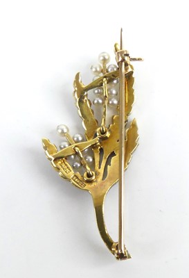 Lot 2543 - A yellow metal pearl brooch designed as a...