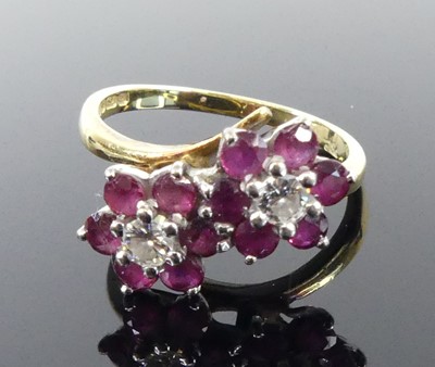 Lot 2507 - An 18ct yellow and white gold, ruby and...